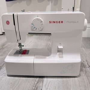 singer promise ii comes w goodies